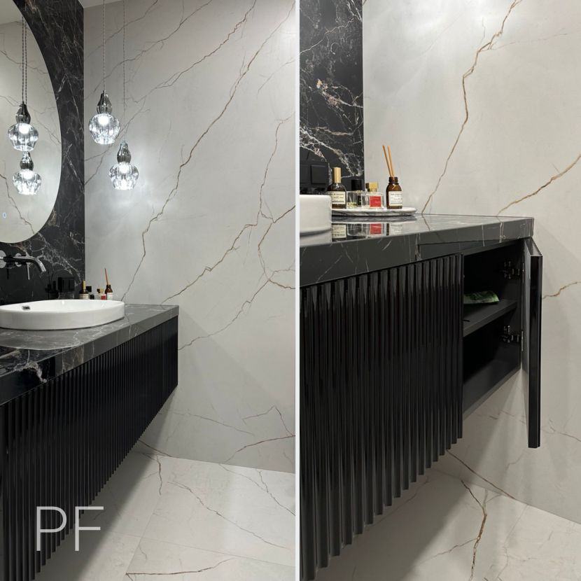 Черная тумба с рельефными фасадами