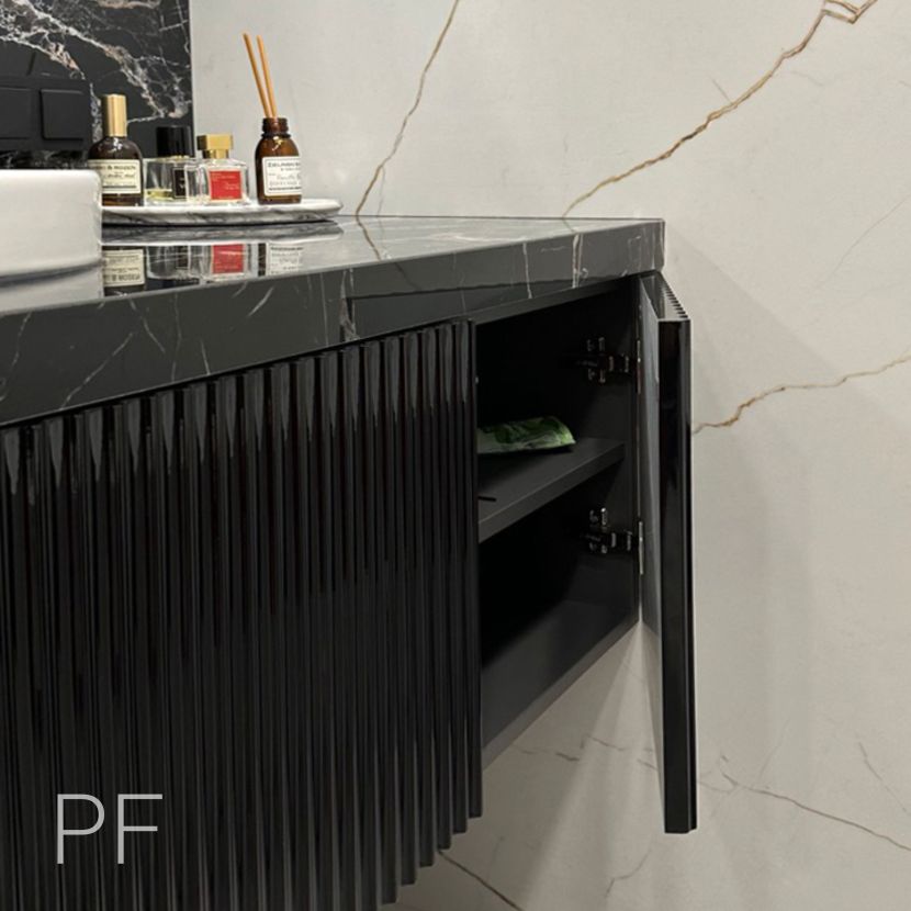 Черная тумба с рельефными фасадами